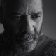 Denzel Washington cracks a grim smile as Macbeth.